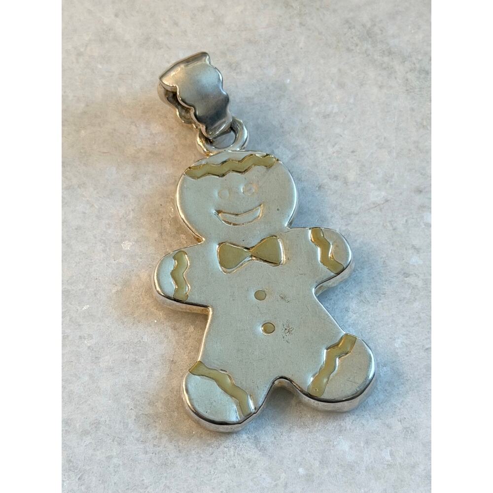 Signed MJ gingerbread man pendant